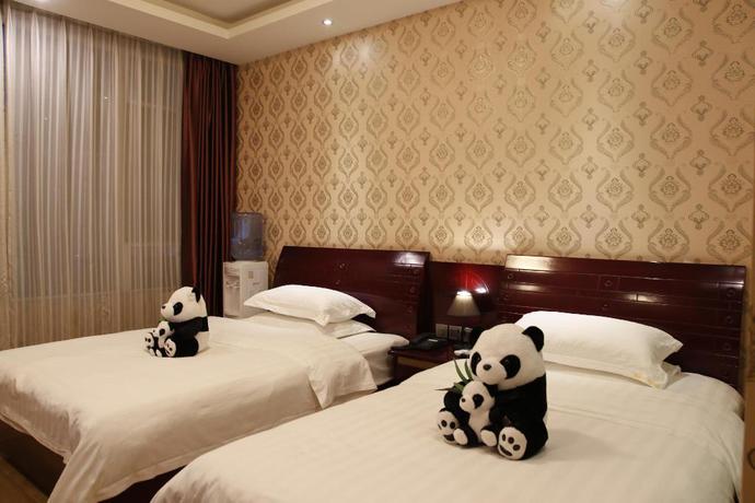 Imagen de la habitación del Hotel Mount Emei Happy Hotel. Foto 4