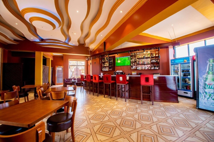 Imagen del bar/restaurante del Hotel Mount Royal Villa. Foto 4