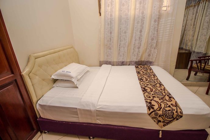 Imagen de la habitación del Hotel Mount Zion Annex. Foto 8