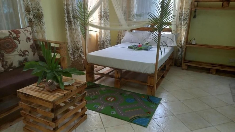 Imagen de la habitación del Hotel Mount Zion Paradise Guest House. Foto 4