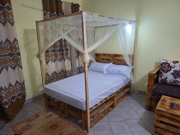 Imagen de la habitación del Hotel Mount Zion Paradise Guest House. Foto 7