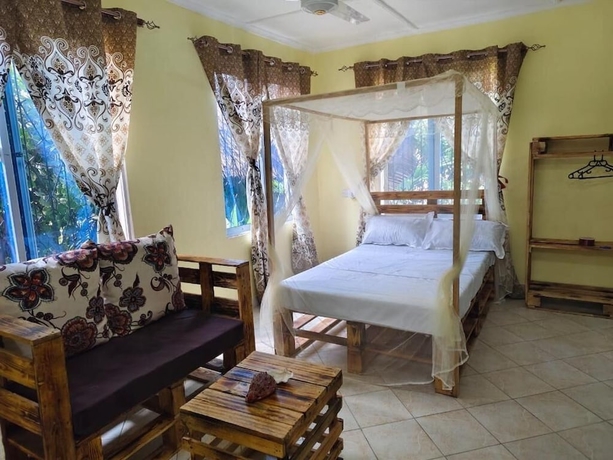 Imagen de la habitación del Hotel Mount Zion Paradise Guest House. Foto 11