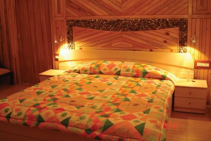 Imagen de la habitación del Hotel Mountain Club Bhimtal. Foto 2