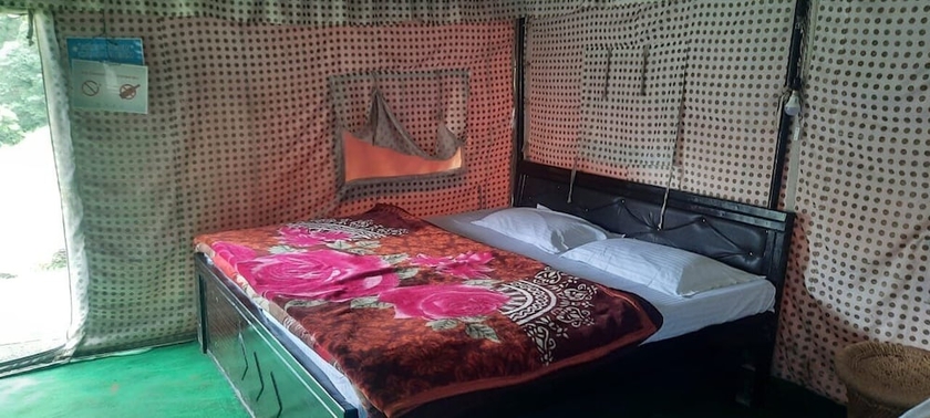 Imagen de la habitación del Hotel Mountain Deligh Camp Chopta. Foto 12