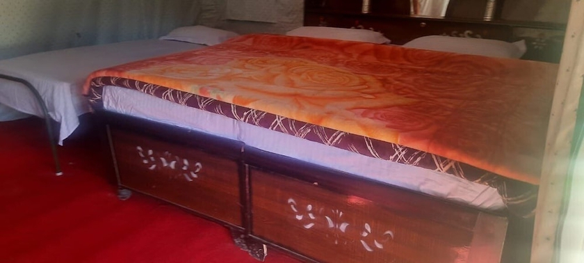 Imagen de la habitación del Hotel Mountain Deligh Camp Chopta. Foto 15