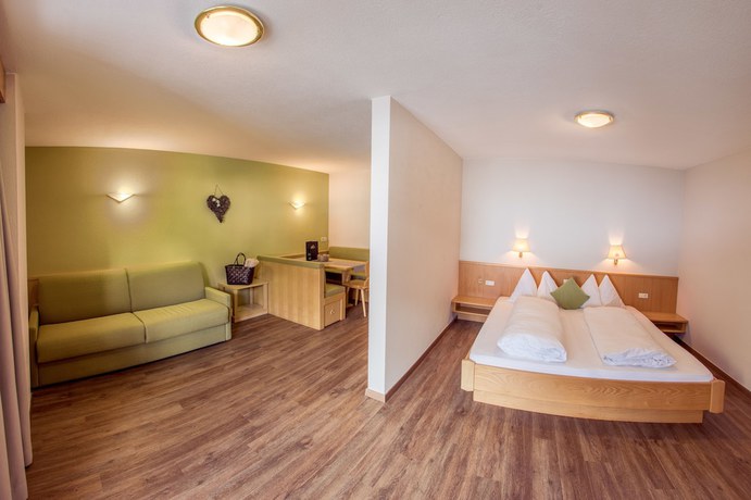 Imagen de la habitación del Hotel Mountain Living Apartments. Foto 9