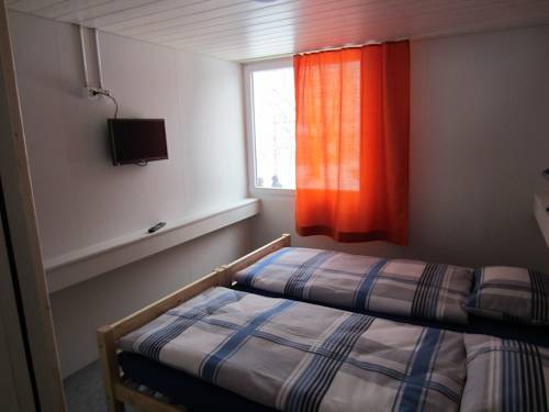 Imagen de la habitación del Hotel Mountain Lodge Backpackercamp. Foto 6