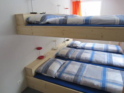 Imagen de la habitación del Hotel Mountain Lodge Backpackercamp. Foto 7