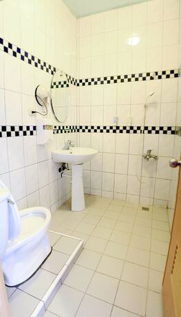 Imagen de la habitación del Hotel Mountain Lodge, Jialun. Foto 19