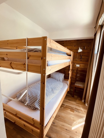 Imagen de la habitación del Hotel Mountain Lodge Sedrun. Foto 7