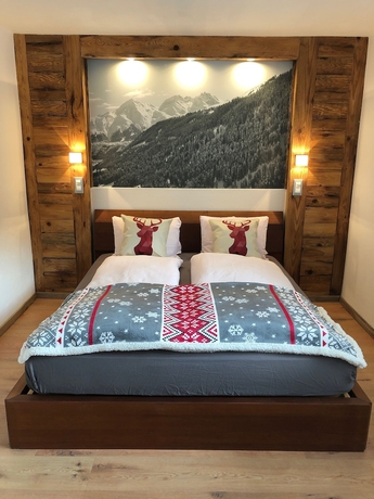 Imagen de la habitación del Hotel Mountain Lodge Sedrun. Foto 8