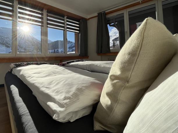 Imagen de la habitación del Hotel Mountain Lodge Sedrun. Foto 10