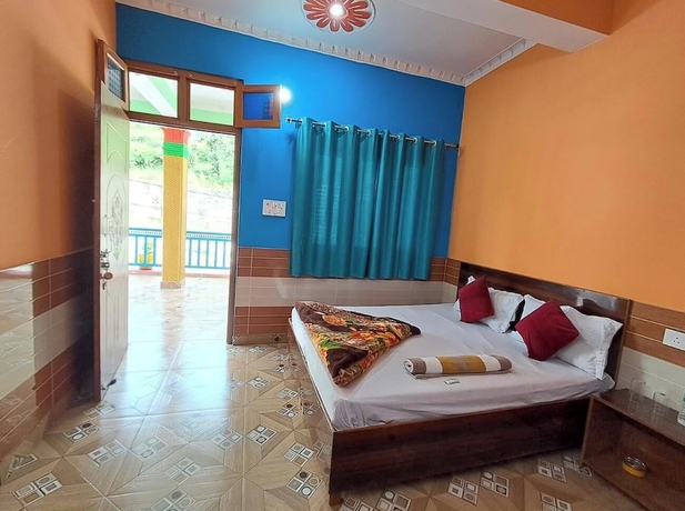 Imagen de la habitación del Hotel Mountain Paradise Barkot. Foto 4