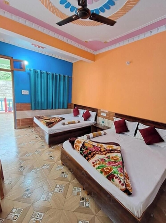 Imagen de la habitación del Hotel Mountain Paradise Barkot. Foto 7