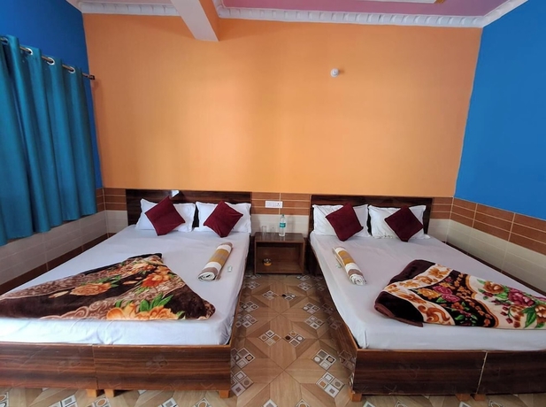 Imagen de la habitación del Hotel Mountain Paradise Barkot. Foto 8
