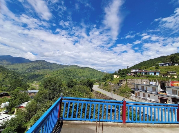 Imagen de la habitación del Hotel Mountain Paradise Barkot. Foto 13