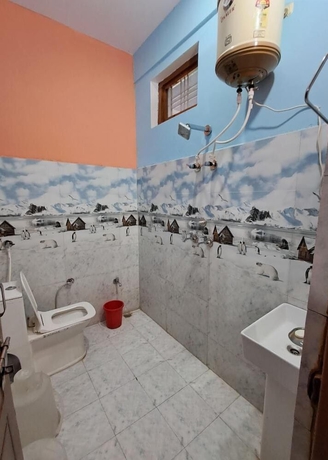 Imagen de la habitación del Hotel Mountain Paradise Barkot. Foto 15