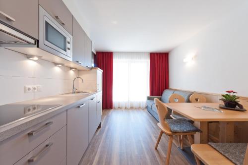 Imagen de la habitación del Hotel Mountain Residence Montana. Foto 5