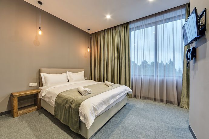 Imagen de la habitación del Hotel Mountain Resort Gantiadi. Foto 7