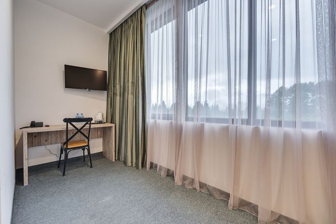 Imagen de la habitación del Hotel Mountain Resort Gantiadi. Foto 10