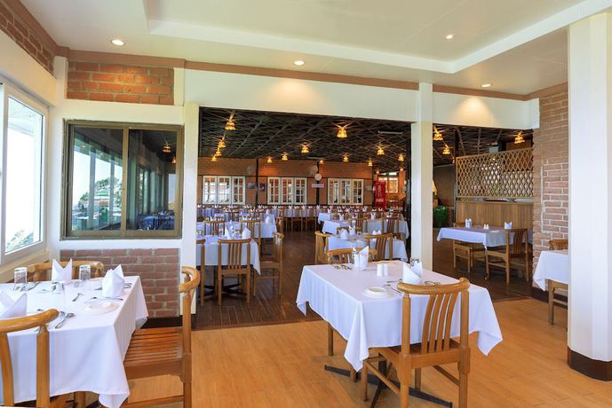 Imagen del bar/restaurante del Hotel Mountain Top, Kinpun. Foto 7