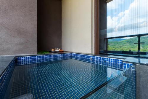 Imagen de la habitación del Hotel Mountain Tree Huizhou Longmen. Foto 19