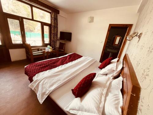 Imagen de la habitación del Hotel Mountain View Resort - A Hidden Resort Manali. Foto 19