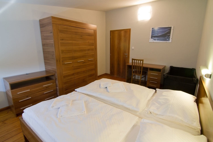 Imagen de la habitación del Hotel Mountain Villas Polana. Foto 7