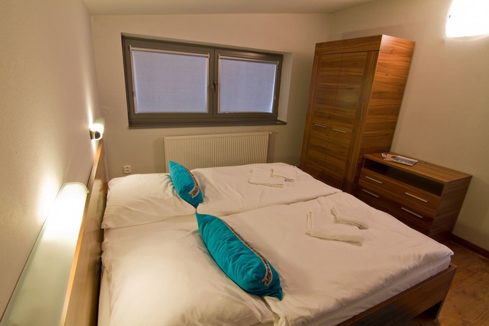 Imagen de la habitación del Hotel Mountain Villas Polana. Foto 8