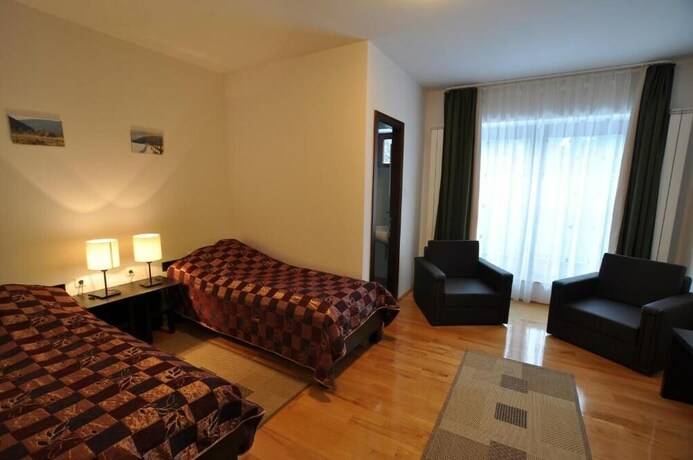 Imagen de la habitación del Hotel Mountain-Rest Pension. Foto 20