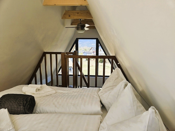 Imagen de la habitación del Hotel MountainsandLakes &ndash; Chaletdorf and Apartments. Foto 2