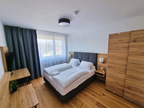 Imagen de la habitación del Hotel MountainsandLakes &ndash; Chaletdorf and Apartments. Foto 3