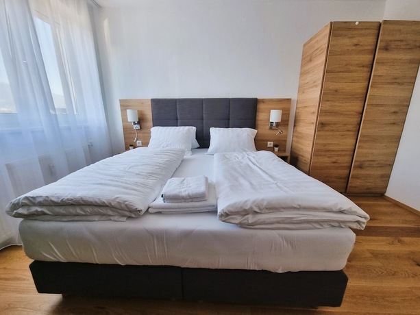 Imagen de la habitación del Hotel MountainsandLakes &ndash; Chaletdorf and Apartments. Foto 4