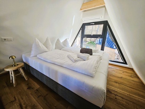 Imagen de la habitación del Hotel MountainsandLakes &ndash; Chaletdorf and Apartments. Foto 5