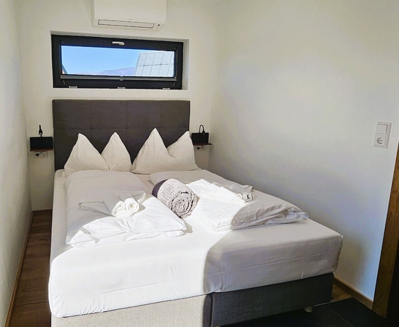 Imagen de la habitación del Hotel MountainsandLakes &ndash; Chaletdorf and Apartments. Foto 6