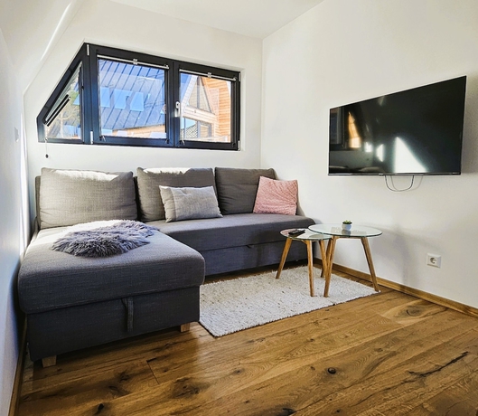 Imagen de la habitación del Hotel MountainsandLakes &ndash; Chaletdorf and Apartments. Foto 10