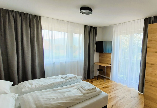 Imagen de la habitación del Hotel MountainsandLakes &ndash; Chaletdorf and Apartments. Foto 11