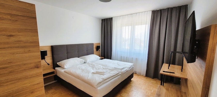 Imagen de la habitación del Hotel MountainsandLakes &ndash; Chaletdorf and Apartments. Foto 12