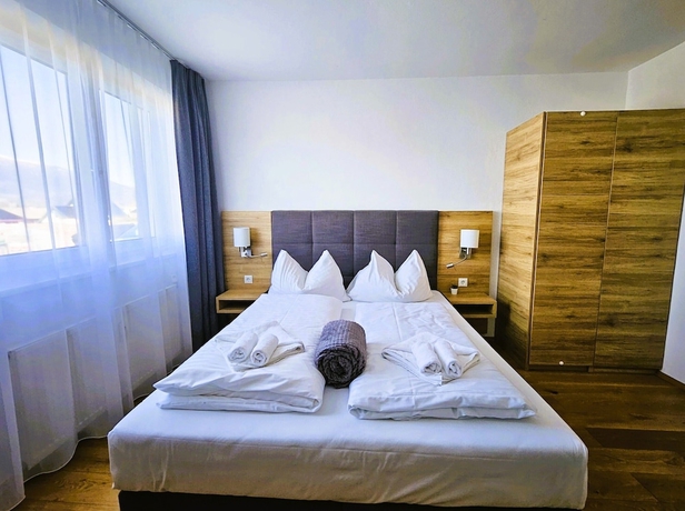 Imagen de la habitación del Hotel MountainsandLakes &ndash; Chaletdorf and Apartments. Foto 15