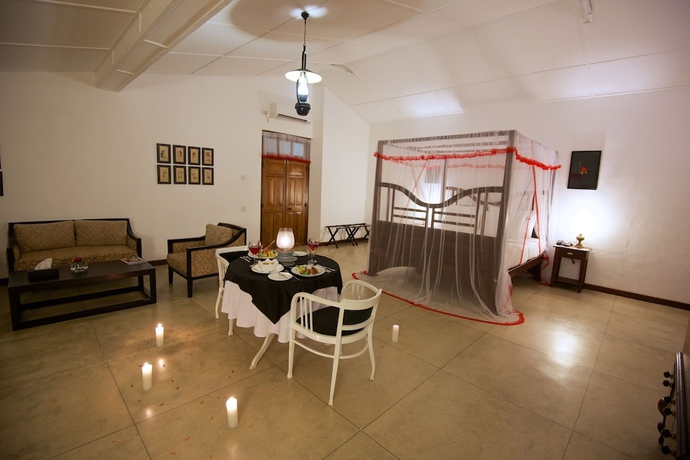 Imagen de la habitación del Hotel Mountbatten Bungalow. Foto 8