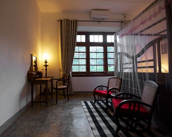 Imagen de la habitación del Hotel Mountbatten Bungalow. Foto 13