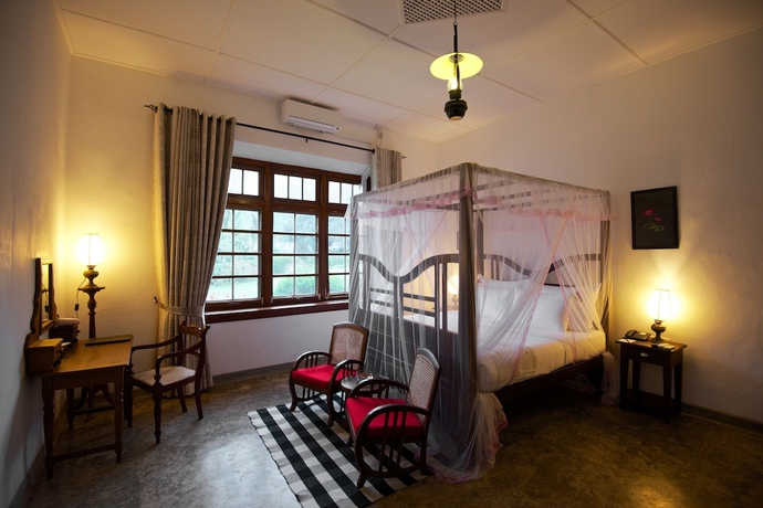 Imagen de la habitación del Hotel Mountbatten Bungalow. Foto 14