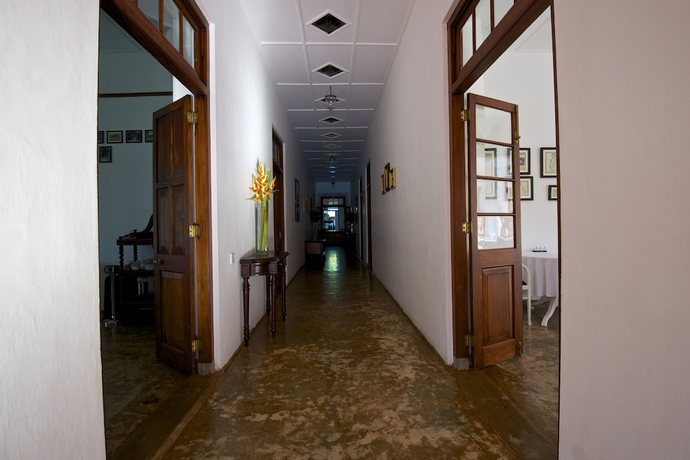 Imagen de la habitación del Hotel Mountbatten Bungalow. Foto 15