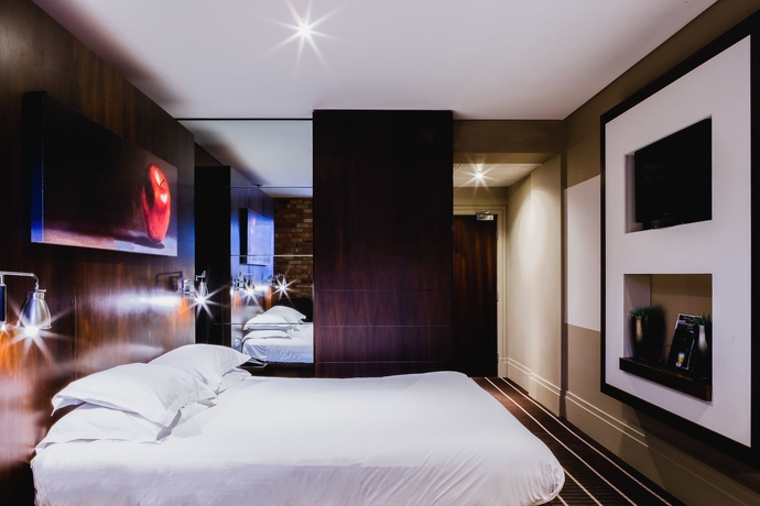 Imagen de la habitación del Hotel Mour. Foto 12