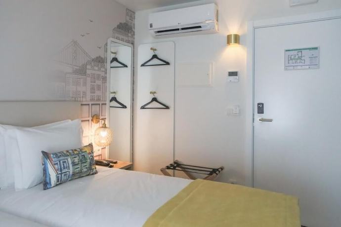 Imagen de la habitación del Hotel Mouraria Lisboa. Foto 8