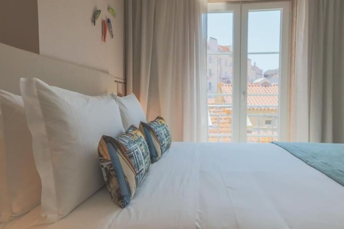 Imagen de la habitación del Hotel Mouraria Lisboa. Foto 10