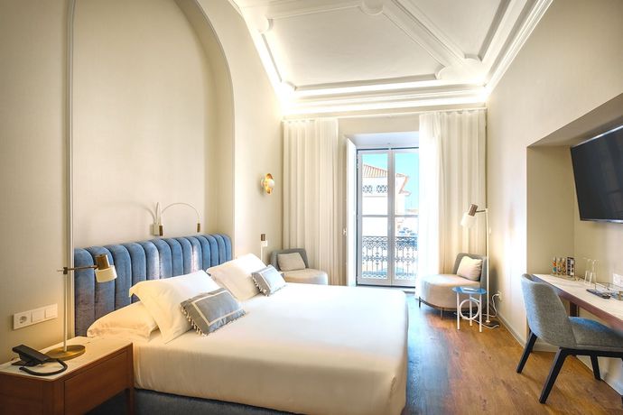 Imagen de la habitación del Hotel Mourasuites. Foto 2