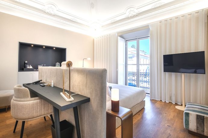 Imagen de la habitación del Hotel Mourasuites. Foto 17