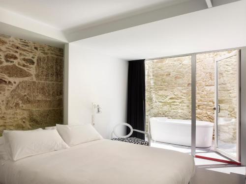 Imagen de la habitación del Hotel Moure. Foto 5