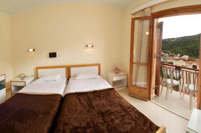 Imagen de la habitación del Hotel Moustakis. Foto 2